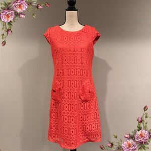 Coral lace sleeveless midi dress.